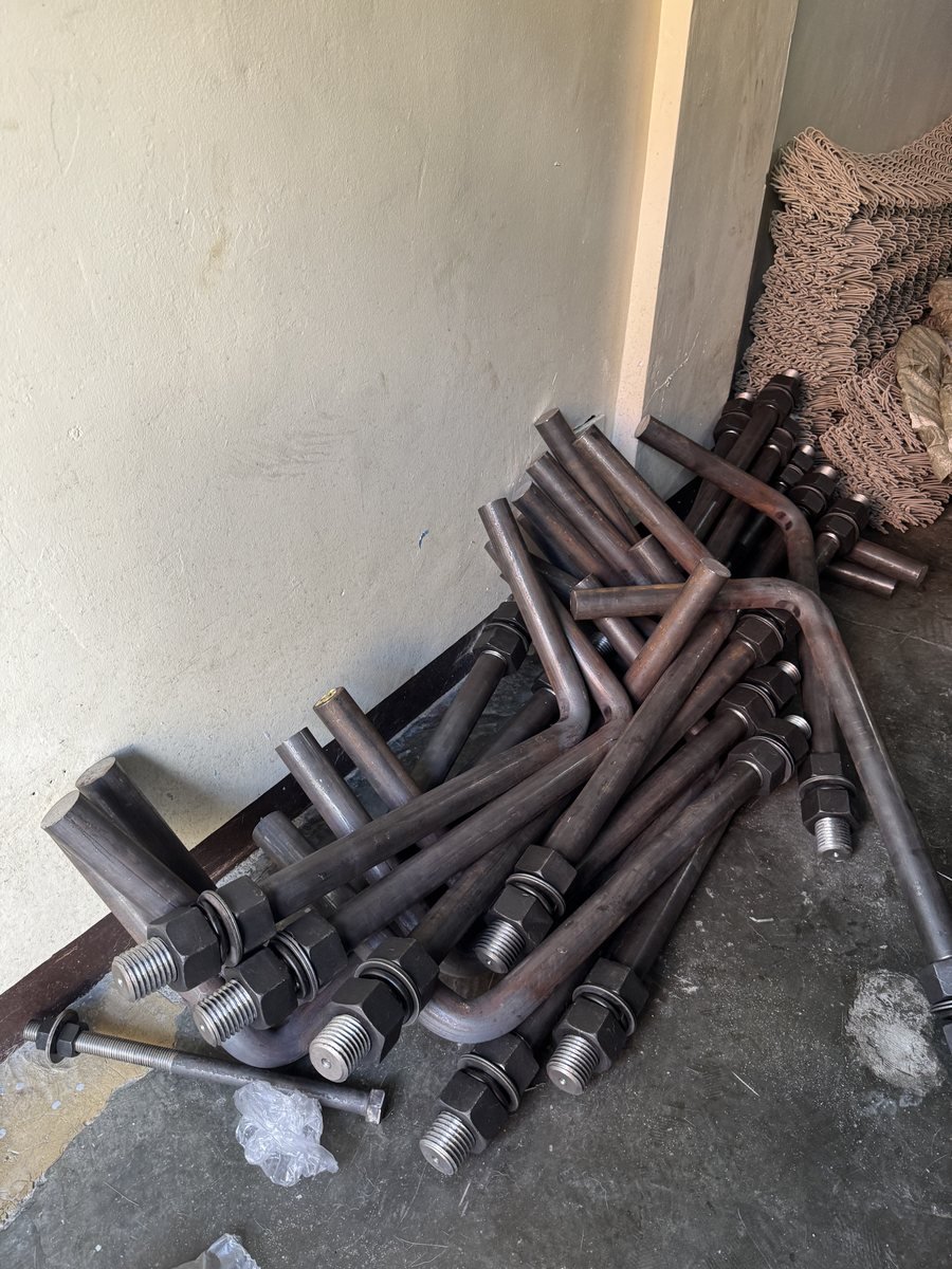 Base plate standing on twin J-bolt anchors — Southend